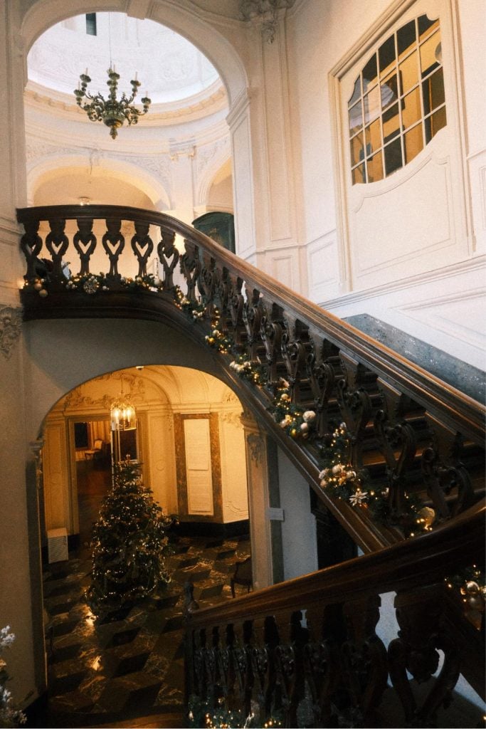 Grand wooden staircase at the Museum of Decorative Arts of Namur